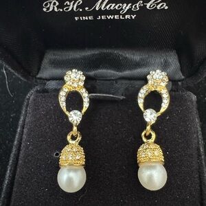 Elegant Gold tone with cubic zirconia and pearl drop earrings.